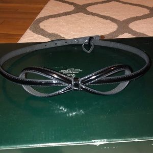 Shiny black White House Black Market bow belt